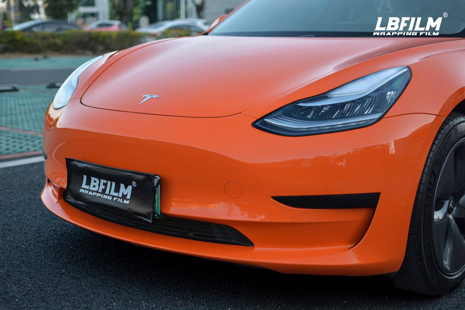 特斯拉model3-lb改色膜高亮橙,犀利的车身融入活力_搜狐汽车_搜狐网