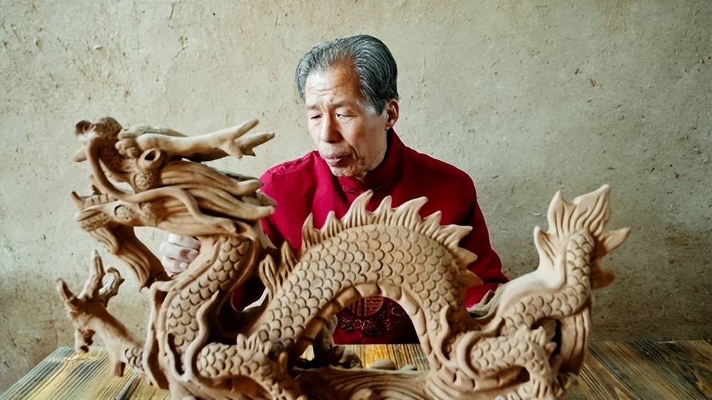 平凉民间艺人刘泉龙年塑"泥龙"_泥塑_作品_传统