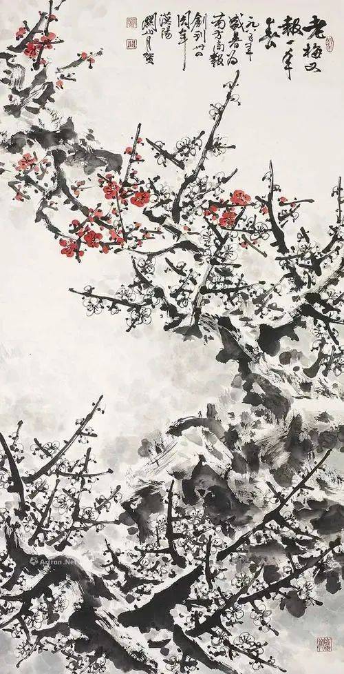 这雪中红梅如火如荼地绽放