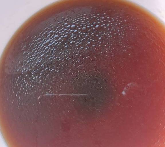 第7步,泡好的水里放入鸡精味精盐生抽老抽耗油醋麻油香油,搅拌均匀,浇