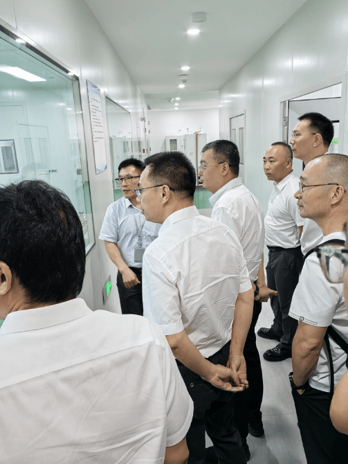 Ruian leaders visit SH-NOMENs Shanghai headquarters to boost local economy through innovation.(图1)