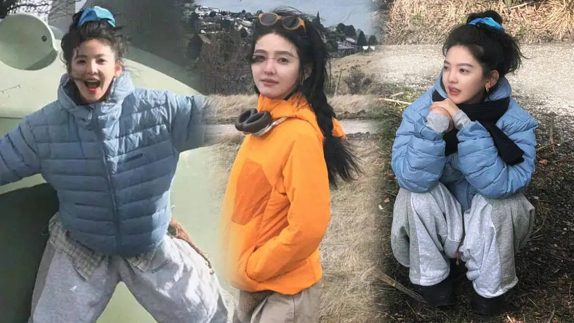 章若楠风中回眸灵动娇憨，笑容甜美松弛又大方