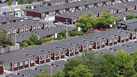 日本亚运会主打“节俭”：让运动员住集装箱，赛事项目换成本小的，历史首次让客场国主转播；一顿操作后预算仍超3倍，面子里子都丢了