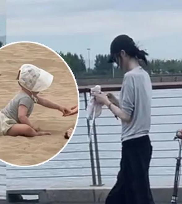 陈伟霆与何穗带儿子出游，单手抱娃父爱满满