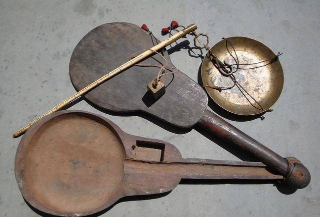 清代象牙秤以第五套人民币为例,经过客观地称量,一张1元的新纸币