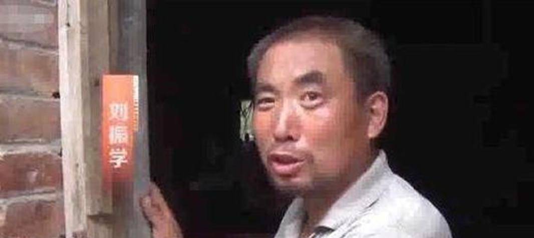 03年,河南省清丰县的"老光棍"刘振学满面春风,嘴角是止不住地上扬