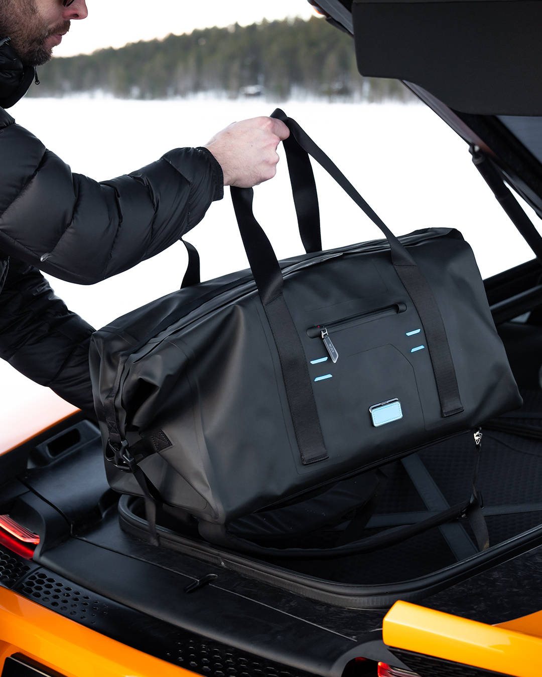 tumi途明与迈凯伦车队联手neommclarenextremee车队推出全新胶囊系列