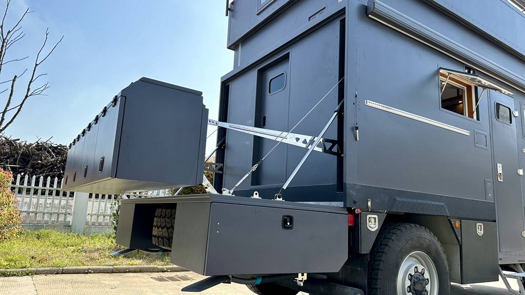 升顶飞桥 后翻转阳台德国man四驱越野房车_搜狐汽车_搜狐网