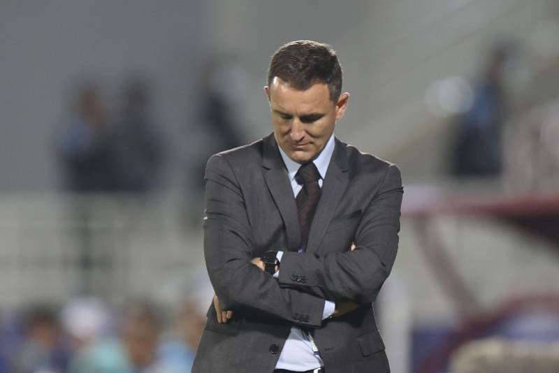 来到亚洲最高水平的足球舞台,扬科维奇穿起了西装,打起了领带.