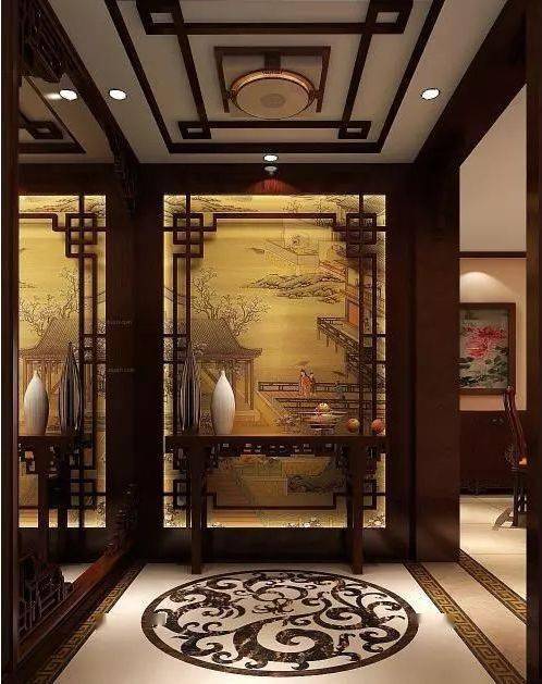 中式风格玄关一般是以中式雕花格,博古架为玄关隔断装饰,一般都会在
