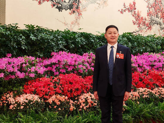 全国人大代表,桦南县鸿源水稻专业合作社理事长孙斌.