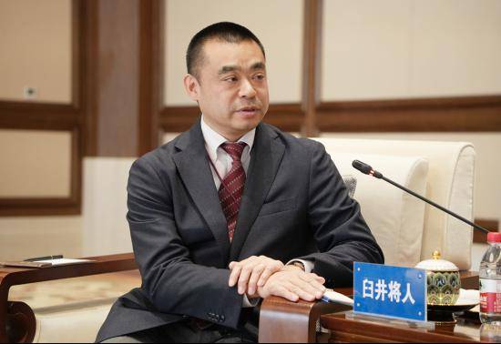 朱建军会见日本驻华大使馆公使臼井将人一行