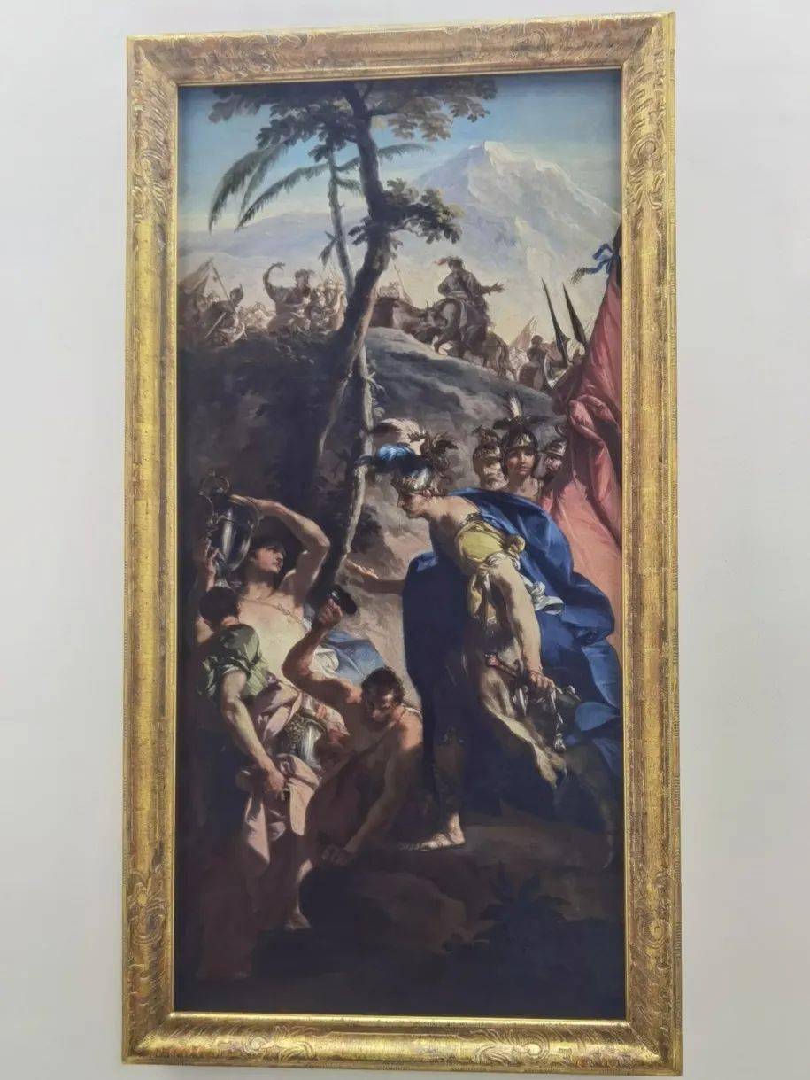 阿尔卑斯山,正如第三幅画所描绘的,他身着蓝袍做着胜利前最后的鼓舞