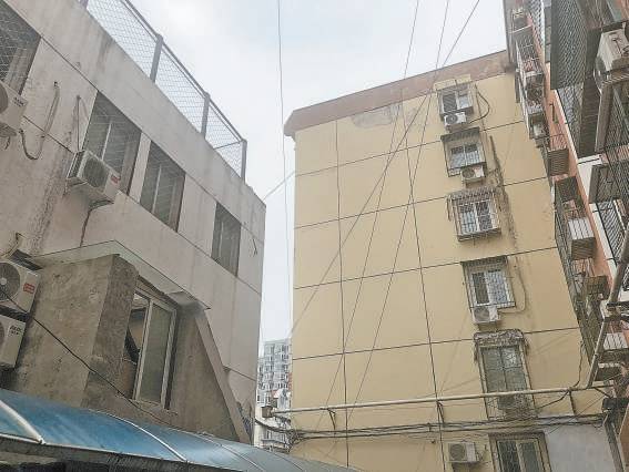 两区交界老楼"半失管"怎么办_居民_小区_单位