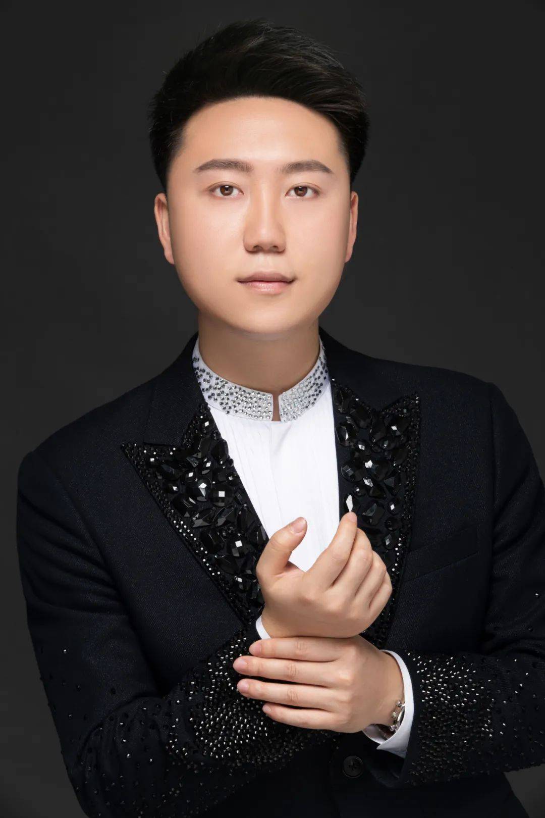 胡志民,中共党员,广东省汕尾市"善美英才"计划,人才引进高校声乐专任