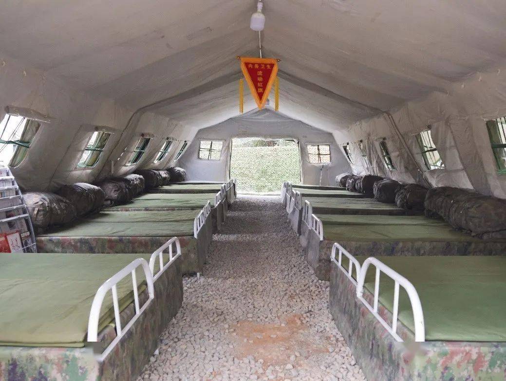 苦累用作"磨刀石"一块块功能区井然有序一顶顶绿帐篷拔地而起平整场地